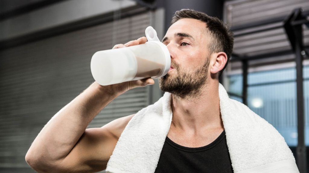 When to Take Protein Shakes: Man drinking protein shake.